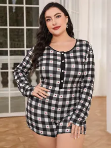 Detailed view of women plus size long sleeve buffalo plaid romper with cute red hearts print.