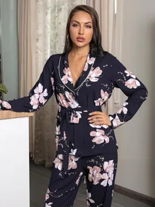 Detailed view of women long sleeve floral pajama set with V-neck and belt for comfortable wear.