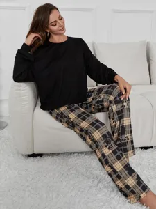 Womens long sleeve sleepwear set with plaid print pants and black top for autumn home wear