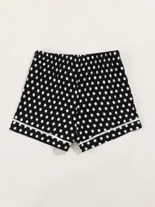 Black and white polka dot sleep shorts with white piping trim, comfortable home pajama shorts.