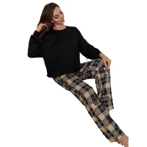 Women long sleeve pajama set with plaid pants and black top casual loungewear main view.