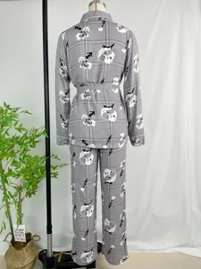 Grey plaid floral long sleeve pajama set detail view, comfortable loungewear backend style.