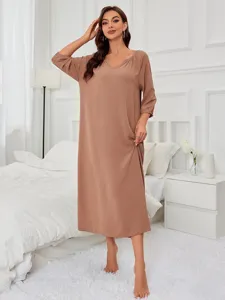 Cozy long-sleeve V-neck midi sleep dress in soft brown fabric, ideal for relaxing homewear.