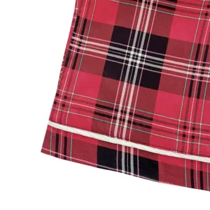 Red and black plaid rayon pajama pants fabric detail with white trim, soft and comfortable.