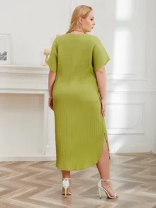 Plus size casual solid green pleated midi dress with short sleeves and side slit.