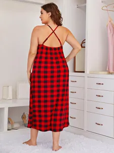Plus size red black plaid cami nightdress detail showing crisscross back straps and relaxed fit.