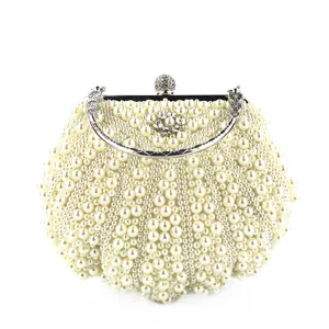 Elegante Perlen Muschel Abendtasche Clutch für Damen mit glitzerndem Strass Griff.