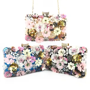 Elegant women's handmade floral beaded evening clutch bag with sequins and chain strap.
