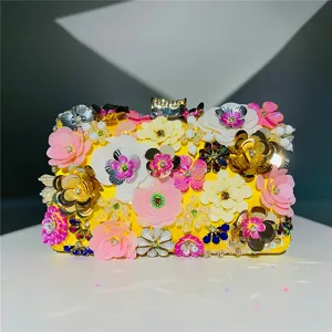 Exquisite handmade beaded floral evening clutch bag detail showing vibrant multi-color sequins.