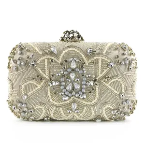 Exquisite handmade beaded evening clutch detail, sparkling rhinestones and pearls embroidery.