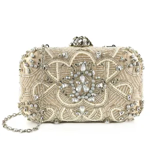 Detailed view of the luxury beaded evening clutch bag, featuring intricate rhinestone and pearl embroidery.
