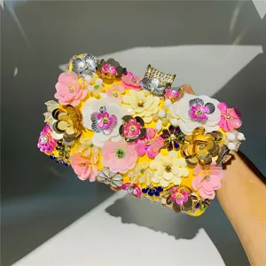 Handcrafted vibrant floral beaded clutch bag detail view, exquisite sequins and pearls decor.