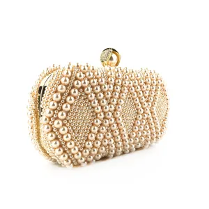Elegant handmade pearl evening clutch bag with gold clasp, perfect for parties and weddings.