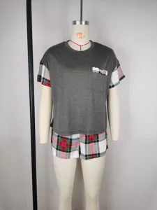 Women summer short sleeve pajama set detail, casual grey top and plaid shorts loungewear.