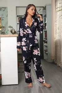 Detailed view of floral long sleeve pajama set featuring lapel and waist belt for women.