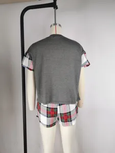 Women's casual short sleeve sleepwear set with plaid shorts and grey top for comfy nights.
