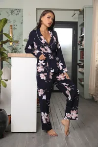 Chic floral pajama set detail, long sleeves, comfortable sleepwear for women cozy nights.