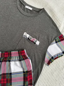 Women short sleeve pajama set with plaid pockets and cuffs detail, comfortable summer sleepwear.