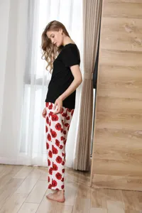 Women two-piece pajama set with short sleeve black top and red rose print long pants