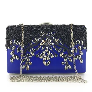 Blue beaded evening clutch bag with sparkling rhinestones and silver chain strap for women.