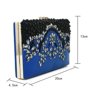 Elegant royal blue evening clutch with black beaded and silver rhinestone embroidery.
