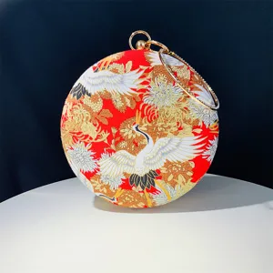 Elegant Chinese style crane print round evening bag with metal handle for party banquets.