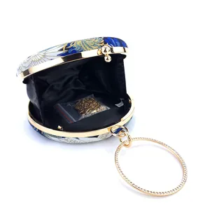 Elegant Chinese style crane print round evening clutch with rhinestone ring handle and chain.