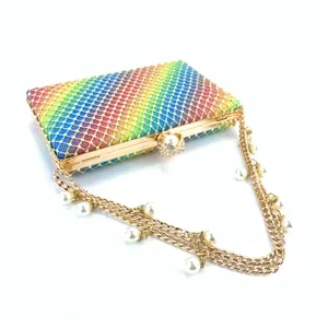 Detailed view of the dazzling rainbow crystal evening clutch with elegant pearl chain.