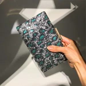 Sac pochette léopard à sequins pour femmes, sac de soirée étincelant avec fermoir métallique.