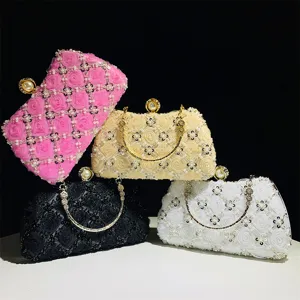 Elegant women's evening clutch bag with handmade floral lace beads and pearl metal clasp.