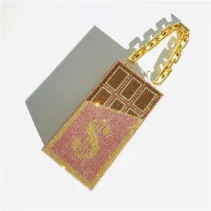 Rhinestone chocolate dollar clutch bag detail, sparkling pink and brown crystal evening bag.