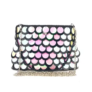 Stunning gradient sequin clutch bag featuring metal chain and black beaded strap for evening parties.