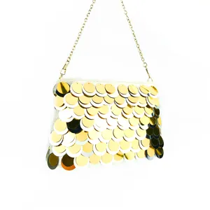 Gold silver sequin evening clutch bag detail view, shimmering chain shoulder purse.