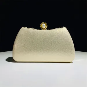 Elegant gold evening clutch bag with pearl clasp for women wedding party dress accessories.