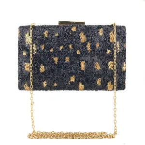 Superbe pochette de soirée léopard à paillettes noires et dorées avec chaîne métallique.