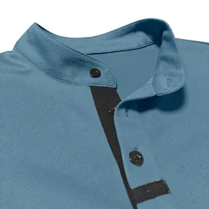 Men's stand collar long sleeve shirt collar and black button detail close up view.