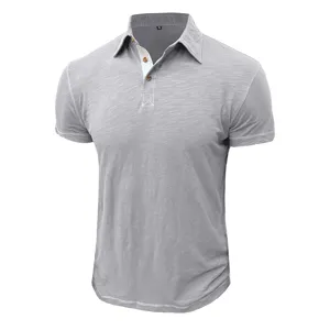 Close-up view of men gray short sleeve polo shirt collar, buttons and stitching details