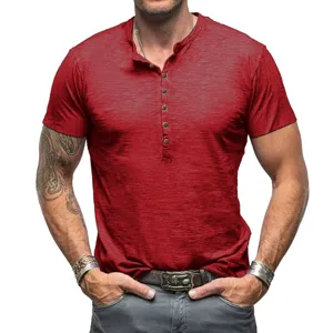 Detailed view of the red men's short sleeve henley t-shirt, showing texture and muscle fit.