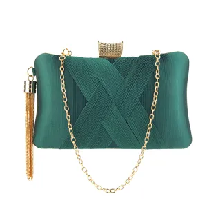 Elegant dark green satin evening clutch bag with gold chain strap, rhinestones and fringe tassel.