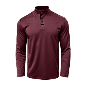 Burgundy long-sleeve men shirt detail, stand collar button design closeup view fabric.