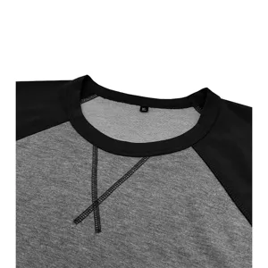Détail de sweat-shirt homme casual à manches longues col rond bicolore avec couture.