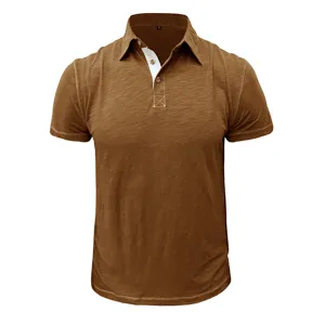 Brown men's short sleeve polo shirt, detail view showing contrast white placket and buttons.