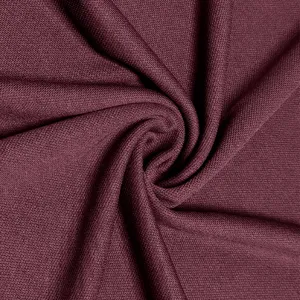 Burgundy fabric material texture detail close-up photography for men's apparel design.