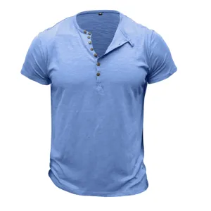 Detailed view of the stylish Henley collar and natural wooden buttons on a blue cotton shirt.