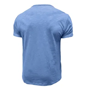 Back detail view of casual solid blue short sleeve t-shirt showing nice fabric texture.