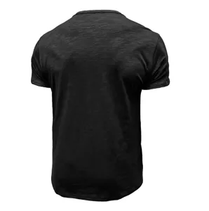 Back view detail of a black short sleeve casual men t-shirt showing the fit and fabric texture.