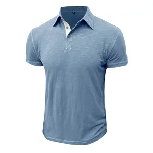 Detailed view of men's short sleeve polo shirt collar, buttons and contrast inner lining.