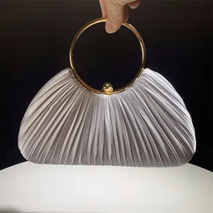 Satin pleated evening clutch bag with metal round ring handle for women wedding party dress.