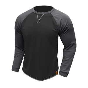 Sweat homme manches longues raglan bicolore col rond vue détail avec finition croisée