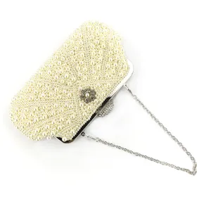 Elegant white pearl evening clutch bag with metal chain strap and sparkling rhinestone clasp.